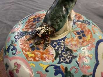 A Chinese famille rose covered vase and a vase with birds and peaches, 19/20th C.